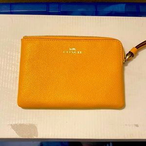 Mustard Yellow Coach Wristlet